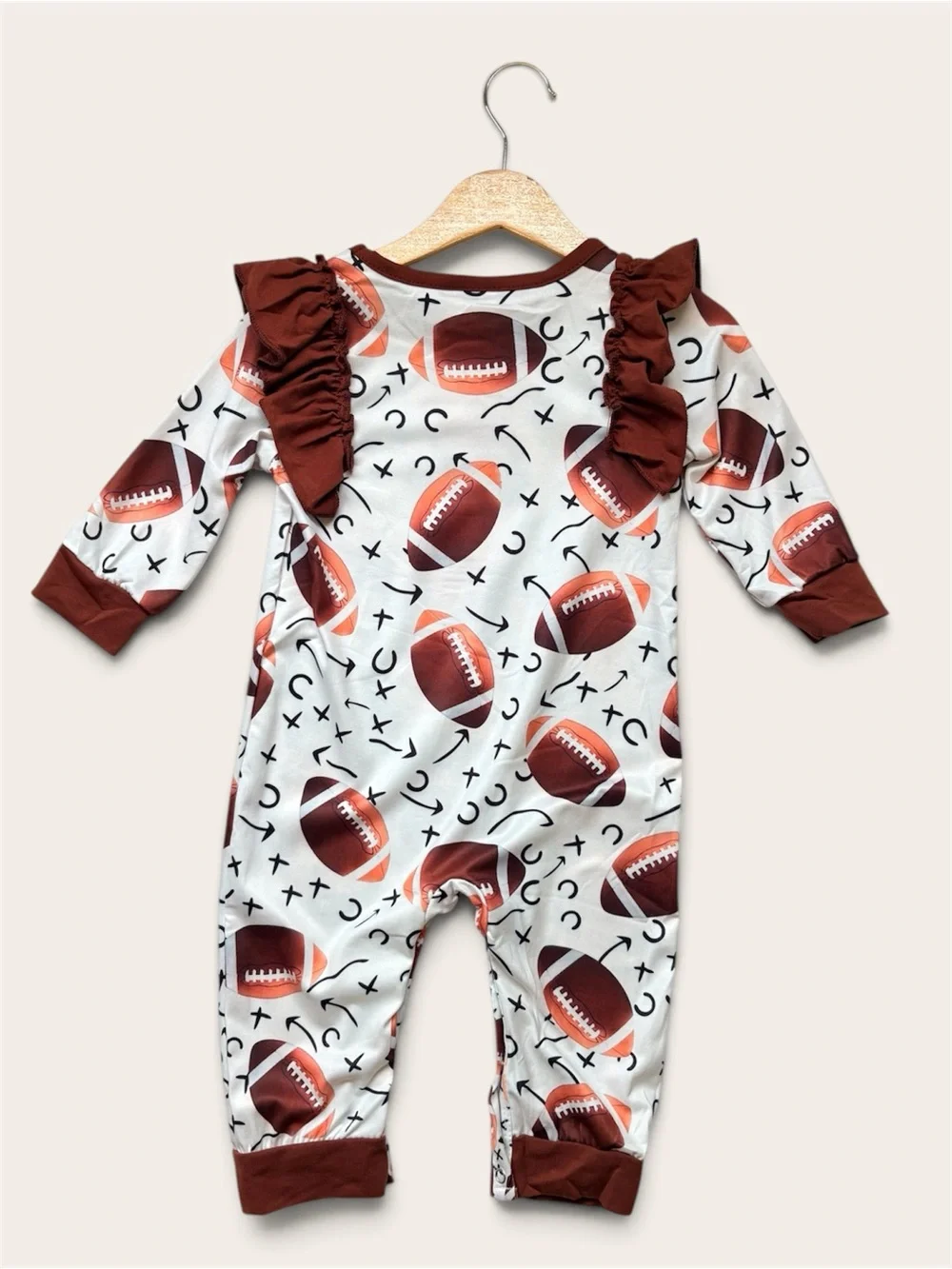Rylee Faith Fall Football Print Ruffle One-Piece Romper